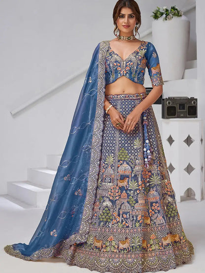 Charming Navy Blue Zari Embroidered Organza Engagement Wear Lehenga Choli