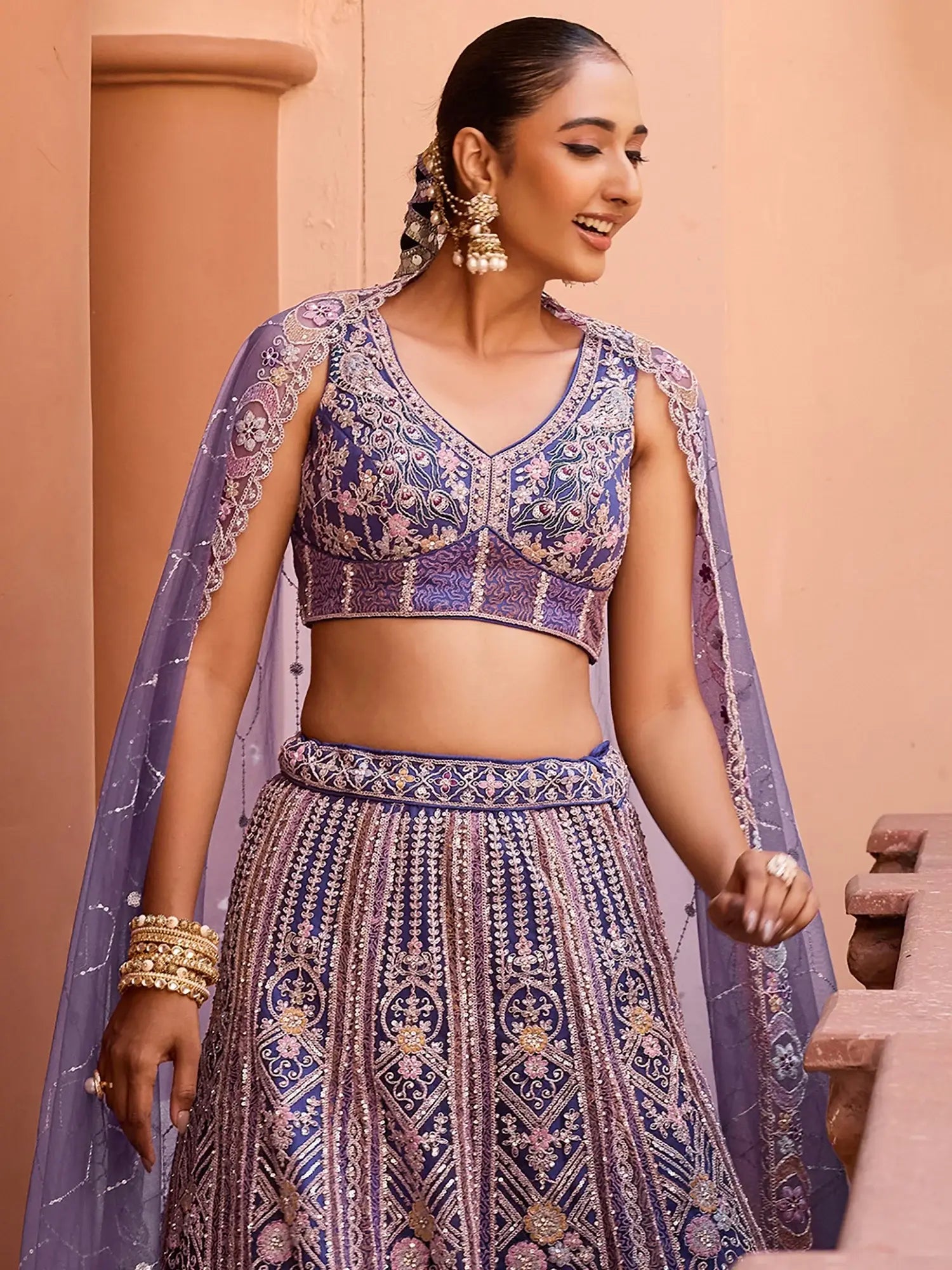 Beautiful Purple Thread Embroidery Net Designer Lehenga Choli With Dupatta