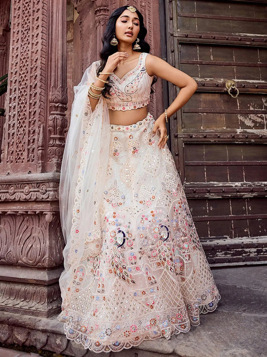 Gleaming Cream Embroidered Net Marraige Wear Lehenga Choli With Dupatta
