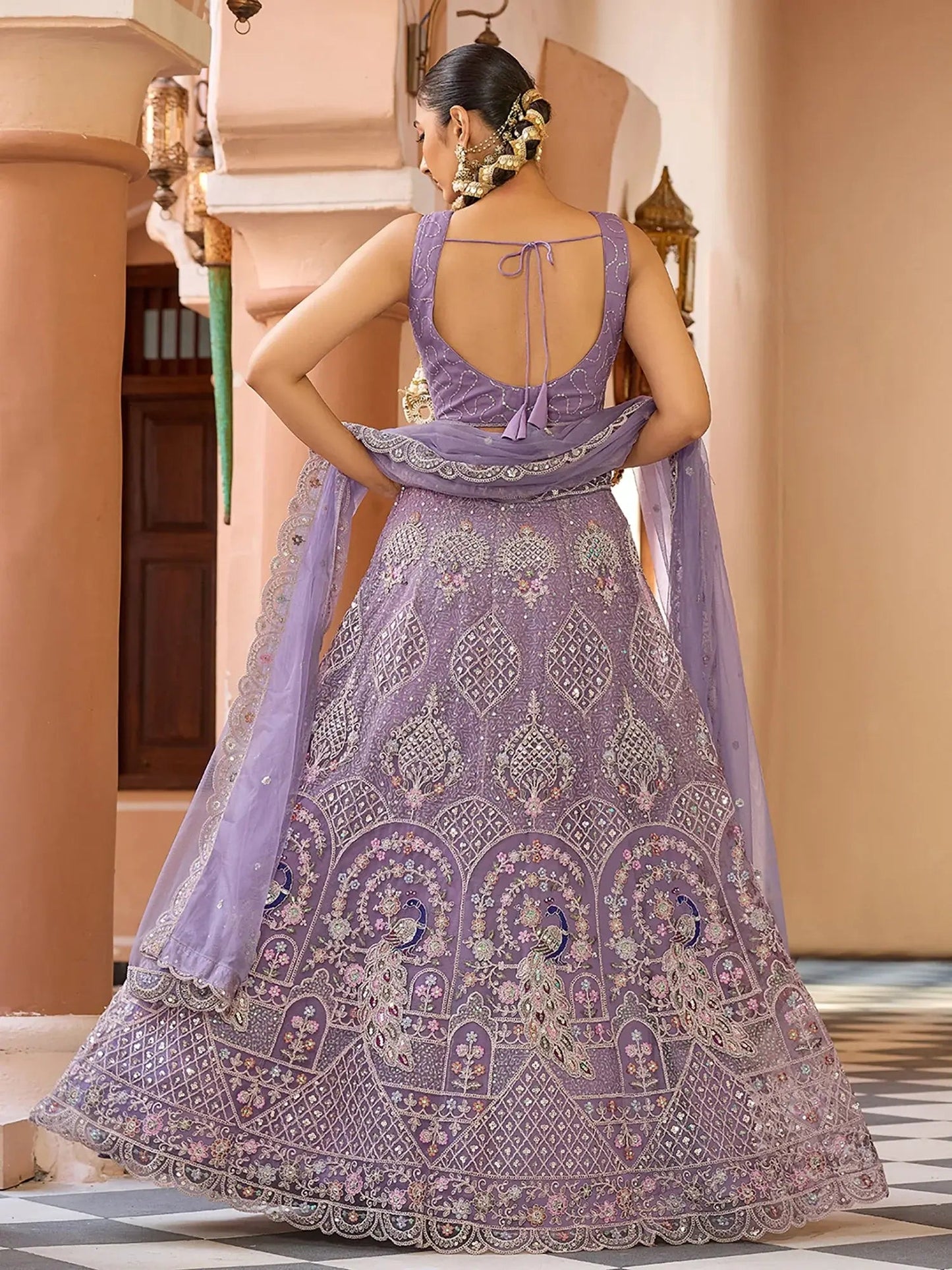 Glamours Mauve Floral Embroidered Net Reception Wear Lehenga With Blouse