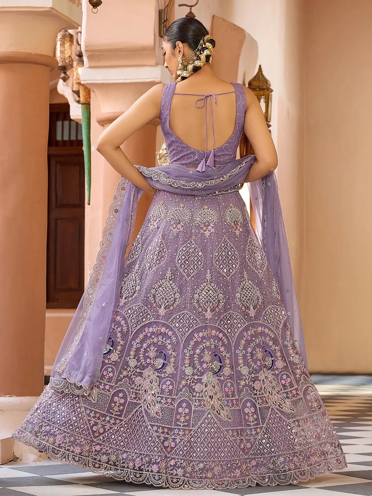 Glamours Mauve Floral Embroidered Net Reception Wear Lehenga With Blouse