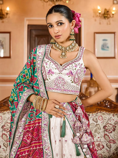 Grand Cream Tissue Evening Wear Lehenga Choli With Patola Print Dupatta