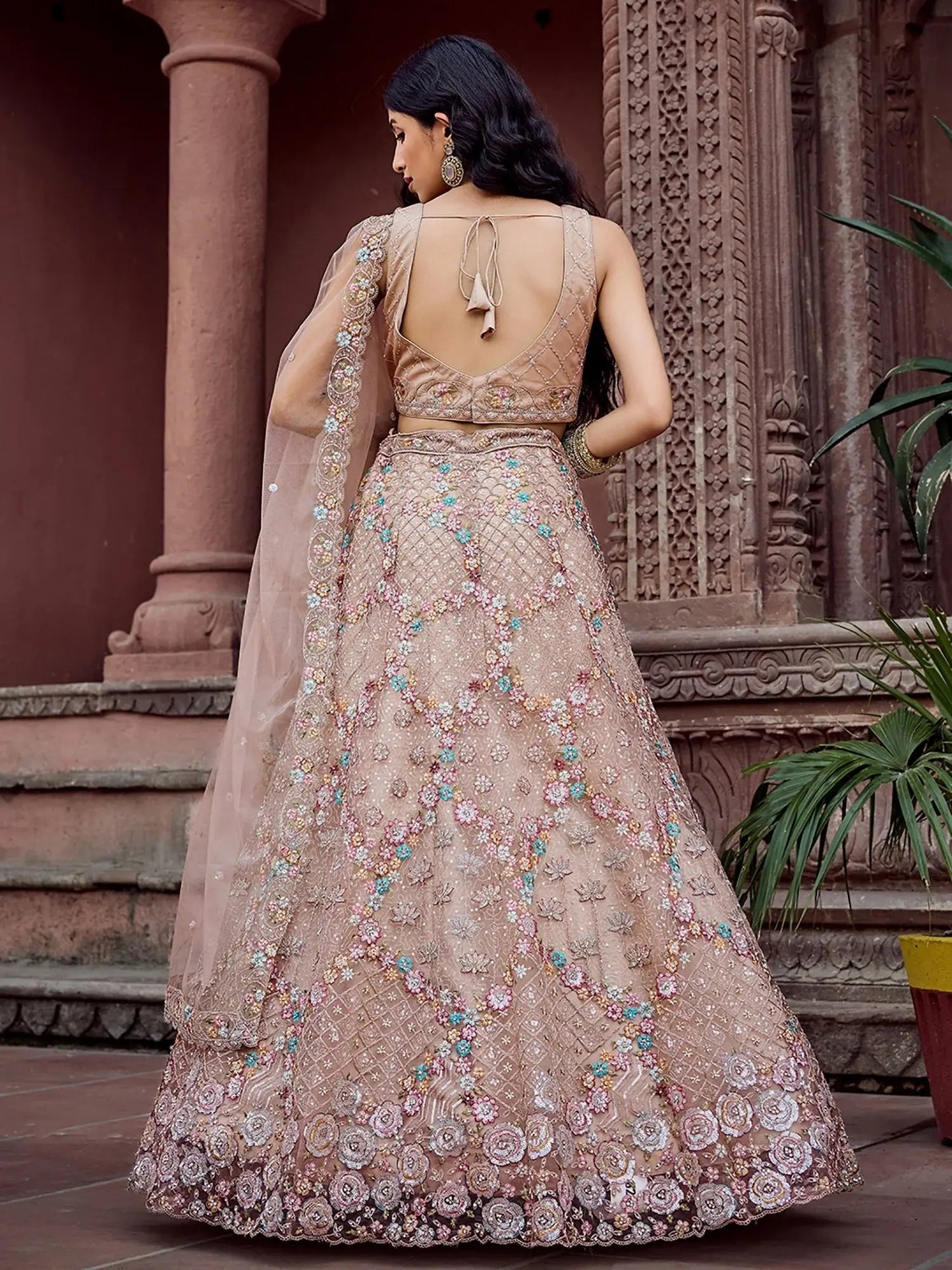 Luxurious Beige Net Floral Embroidery Function Wear Lehenga Choli With Dupatta