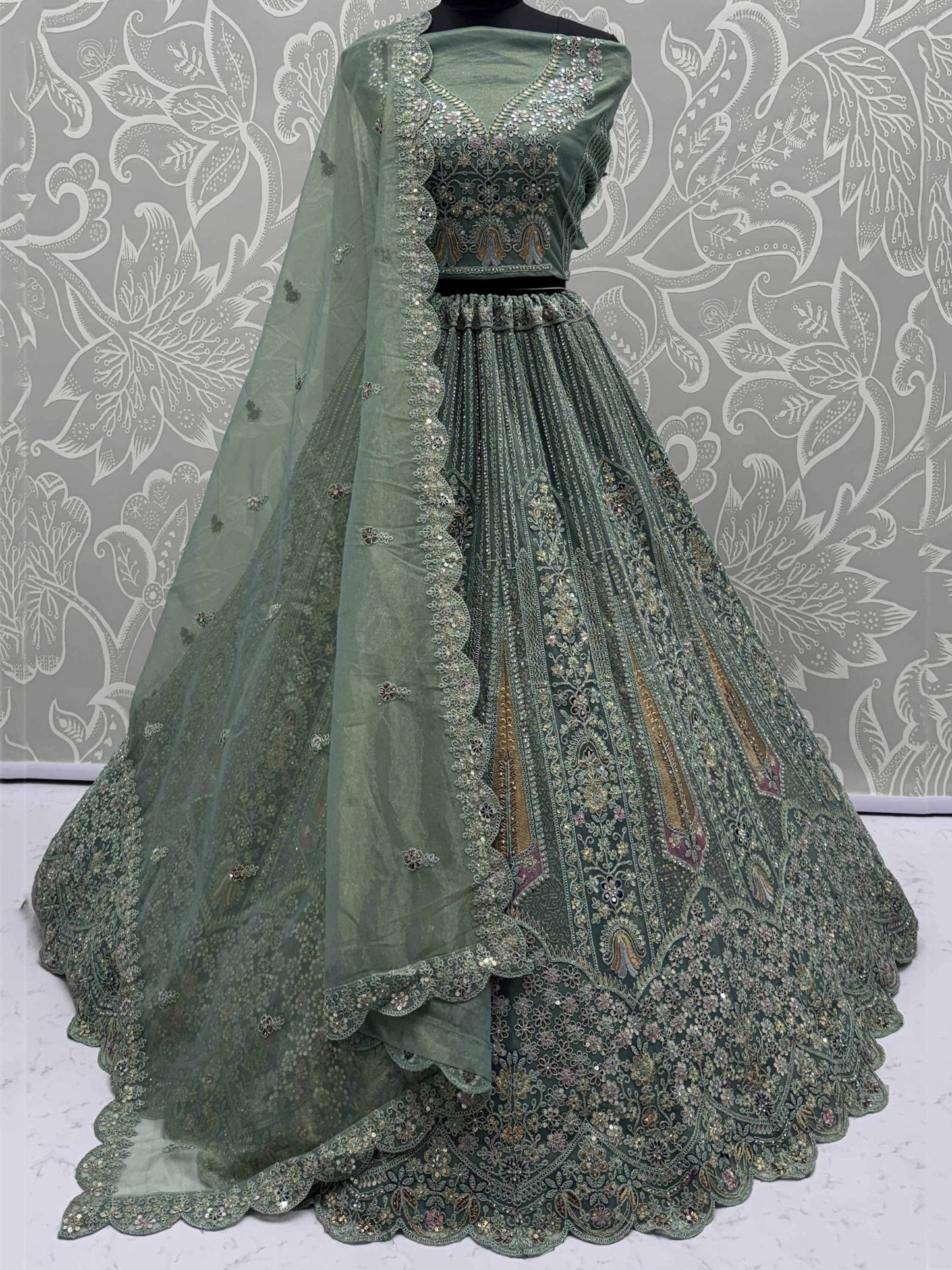 Attractive Green Zircon Work Net Bridesmaid Lehenga With Blouse