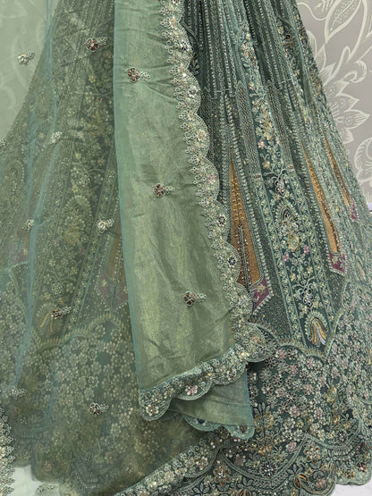 Attractive Green Zircon Work Net Bridesmaid Lehenga With Blouse