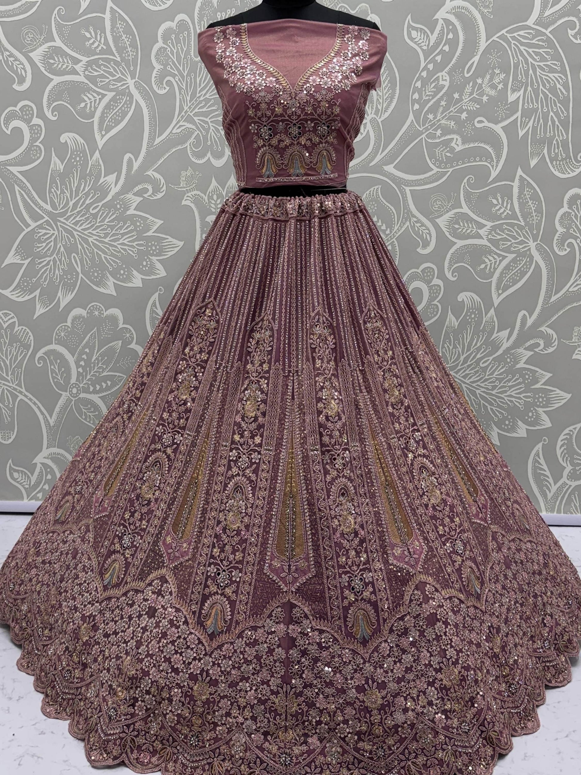Regal Mauve Thread Embroidery Net Engagement Wear Lehenga Choli