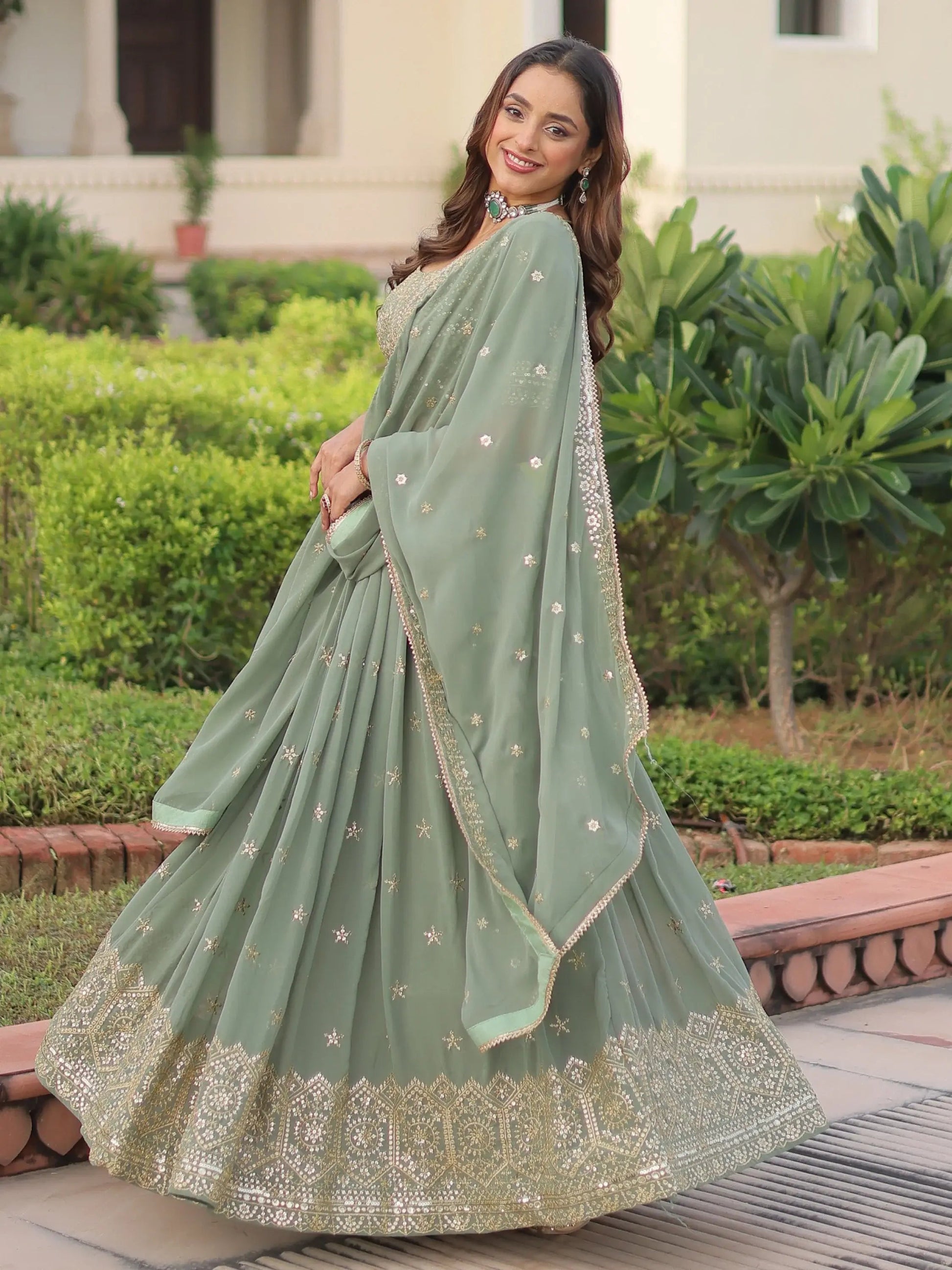 Striking Green Sequins Embroidered Georgette Festive Wear Lehenga Choli With Dupatta