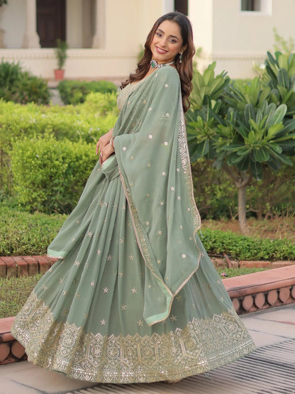 Striking Green Sequins Embroidered Georgette Festive Wear Lehenga Choli With Dupatta