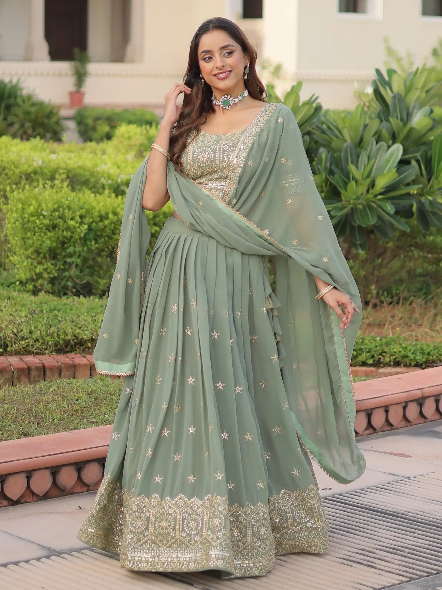 Striking Green Sequins Embroidered Georgette Festive Wear Lehenga Choli With Dupatta