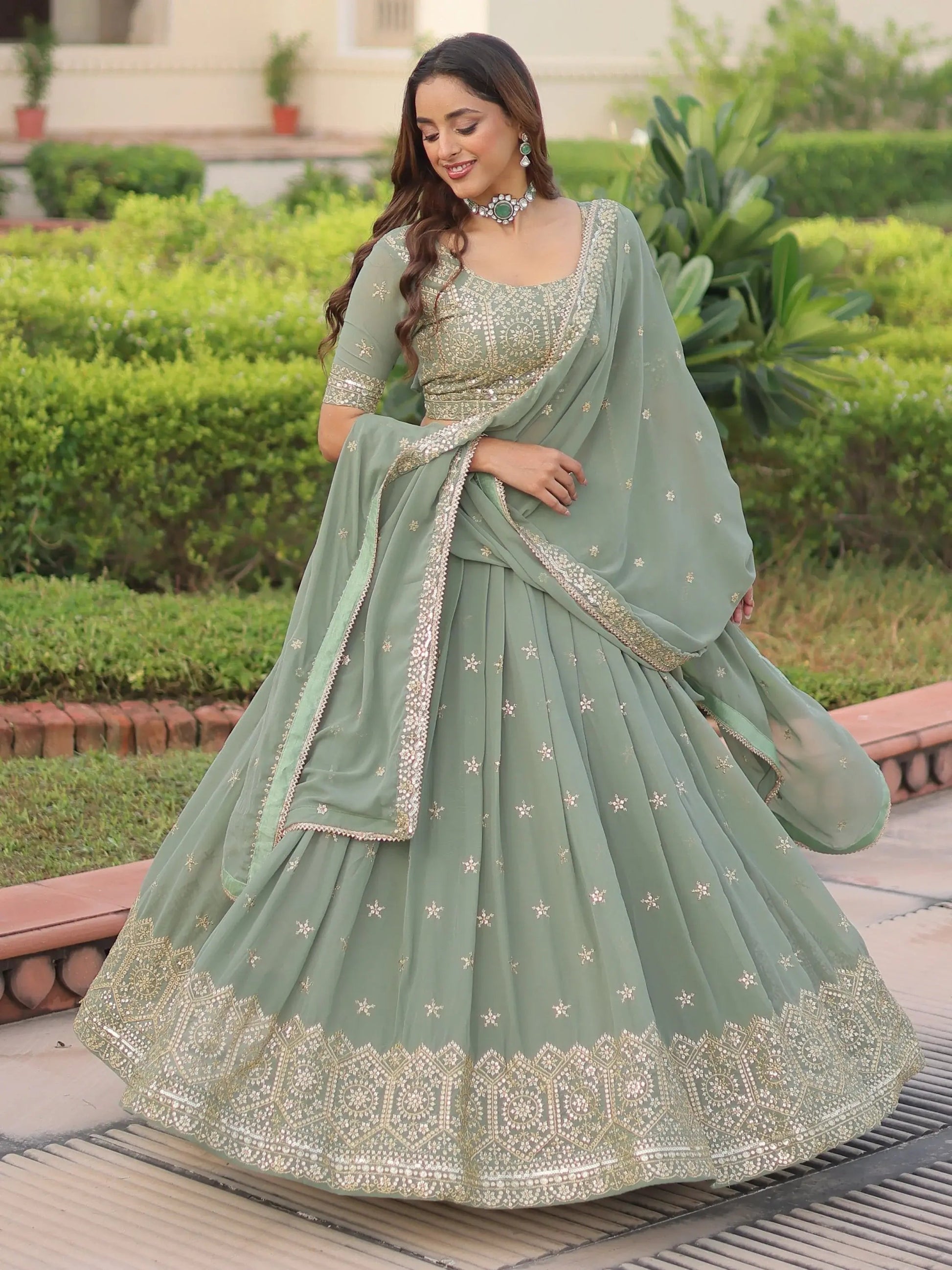 Striking Green Sequins Embroidered Georgette Festive Wear Lehenga Choli With Dupatta