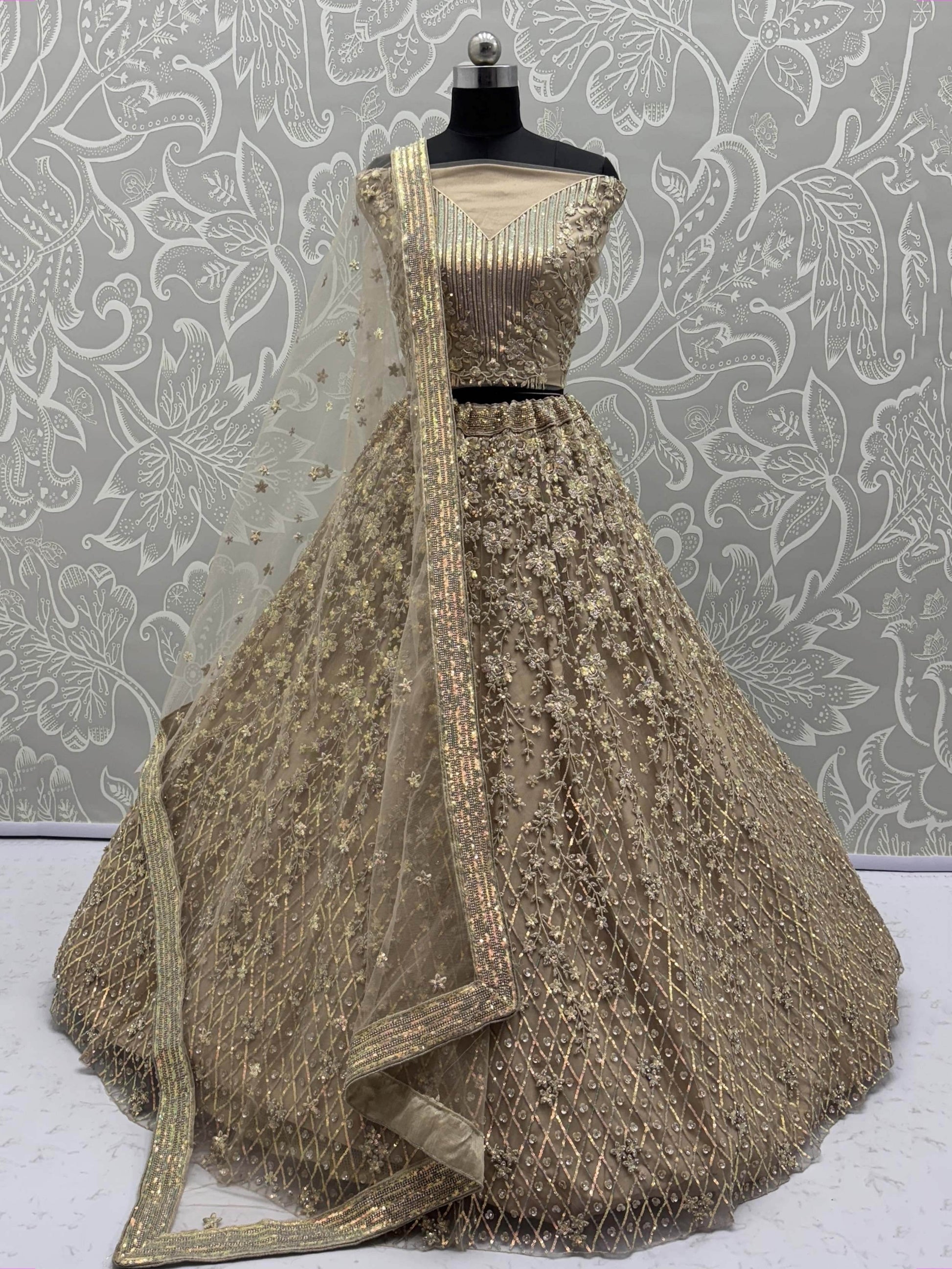 Stellar Beige Sequins Embroidered Net Lehenga Choli With Dupatta