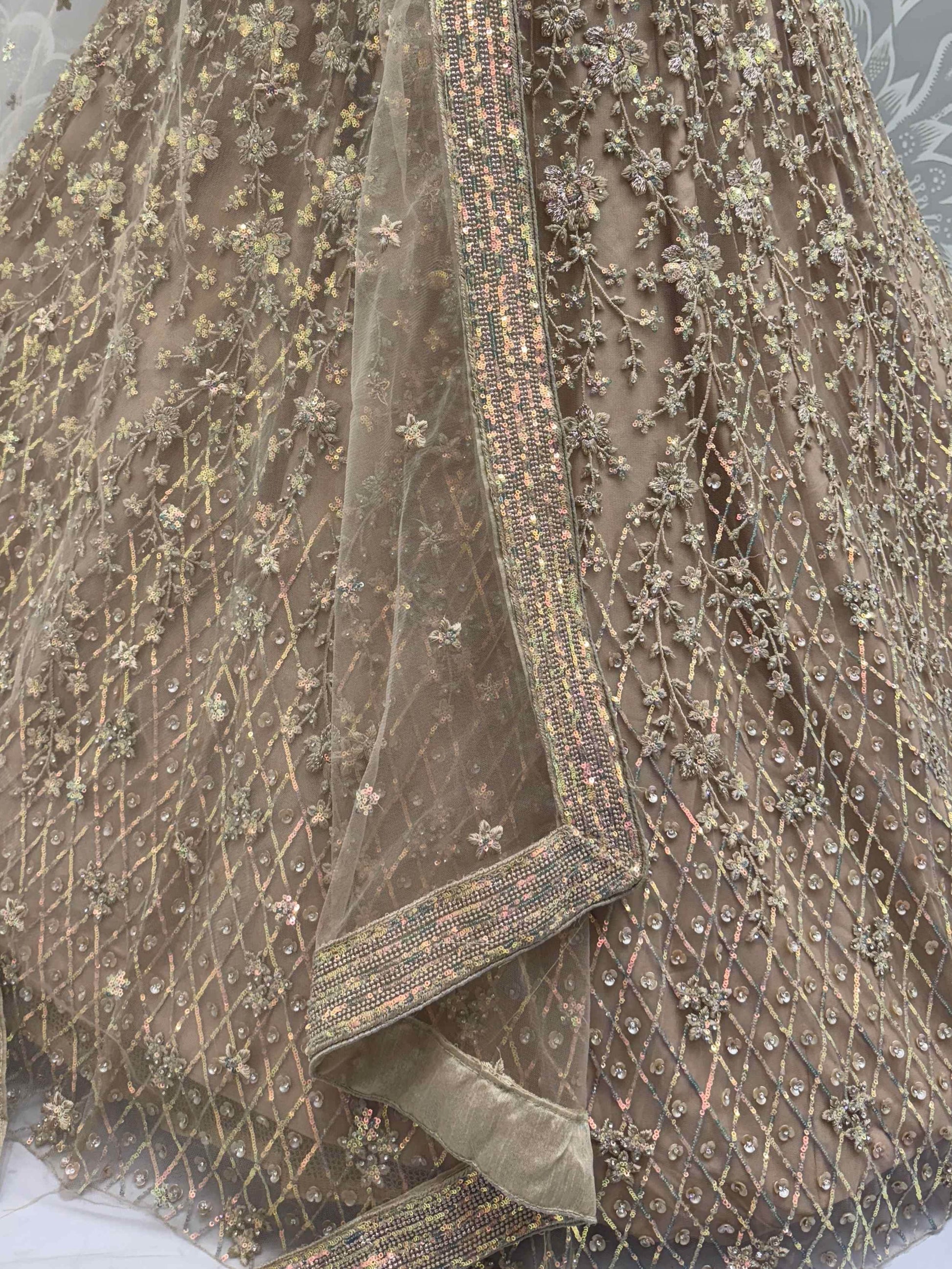 Stellar Beige Sequins Embroidered Net Lehenga Choli With Dupatta