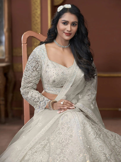 Adorable Off-White Sequins Net Engagement Wear Lehenga Choli - Zeel Clothing