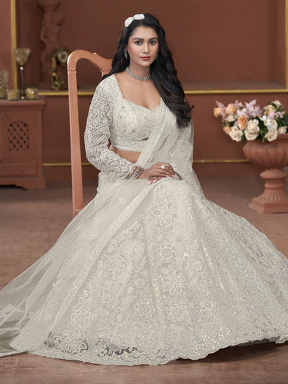 Adorable Off-White Sequins Net Engagement Wear Lehenga Choli - Zeel Clothing