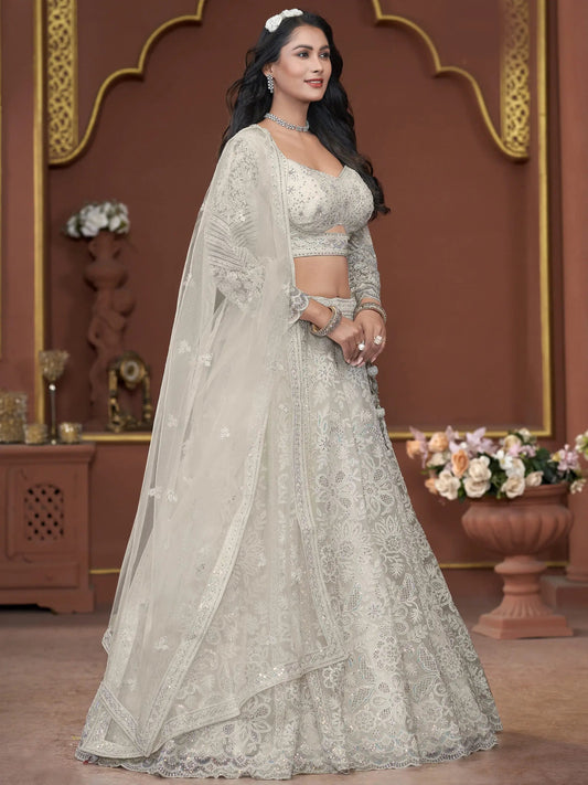Adorable Off-White Sequins Net Engagement Wear Lehenga Choli - Zeel Clothing