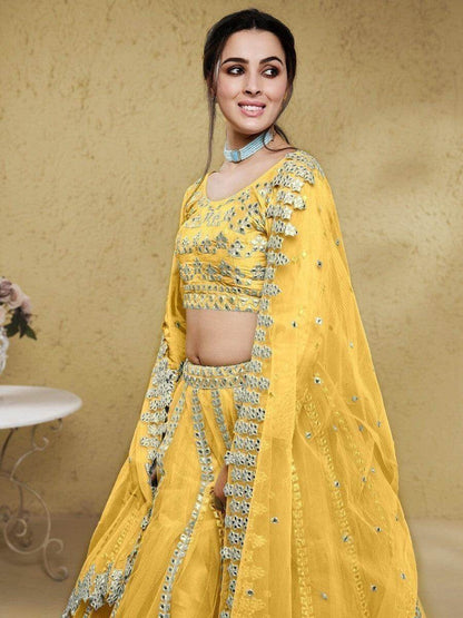 Astounding Yellow Foil Work Net Function Wear Lehenga Choli - Zeel Clothing