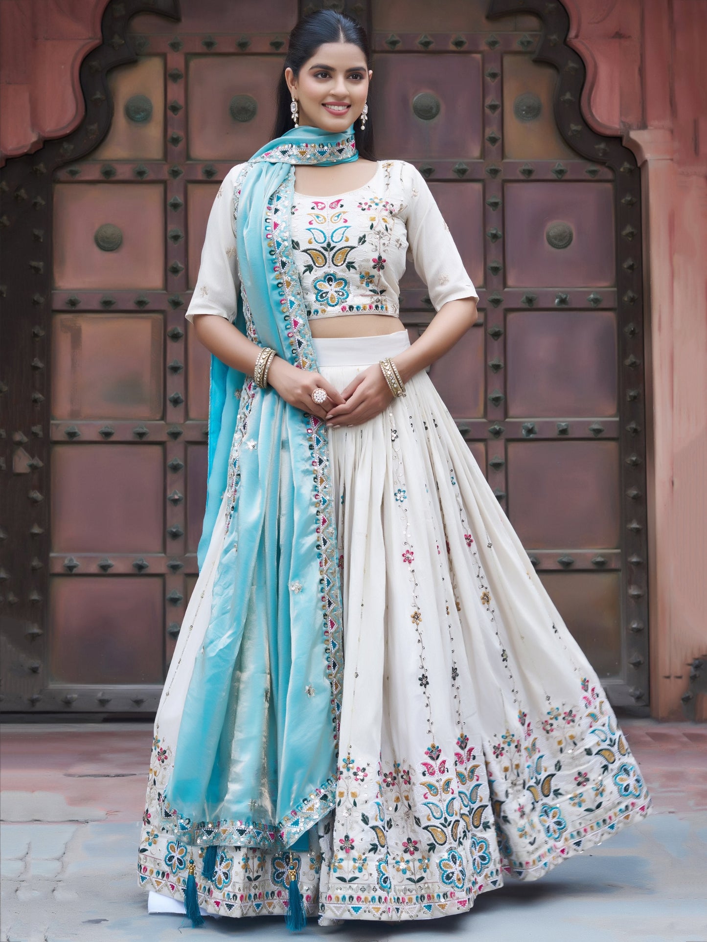 Rich Off-White Thread Embroidery Tissue Bridesmaid Lehenga Choli With Blue Dupatta