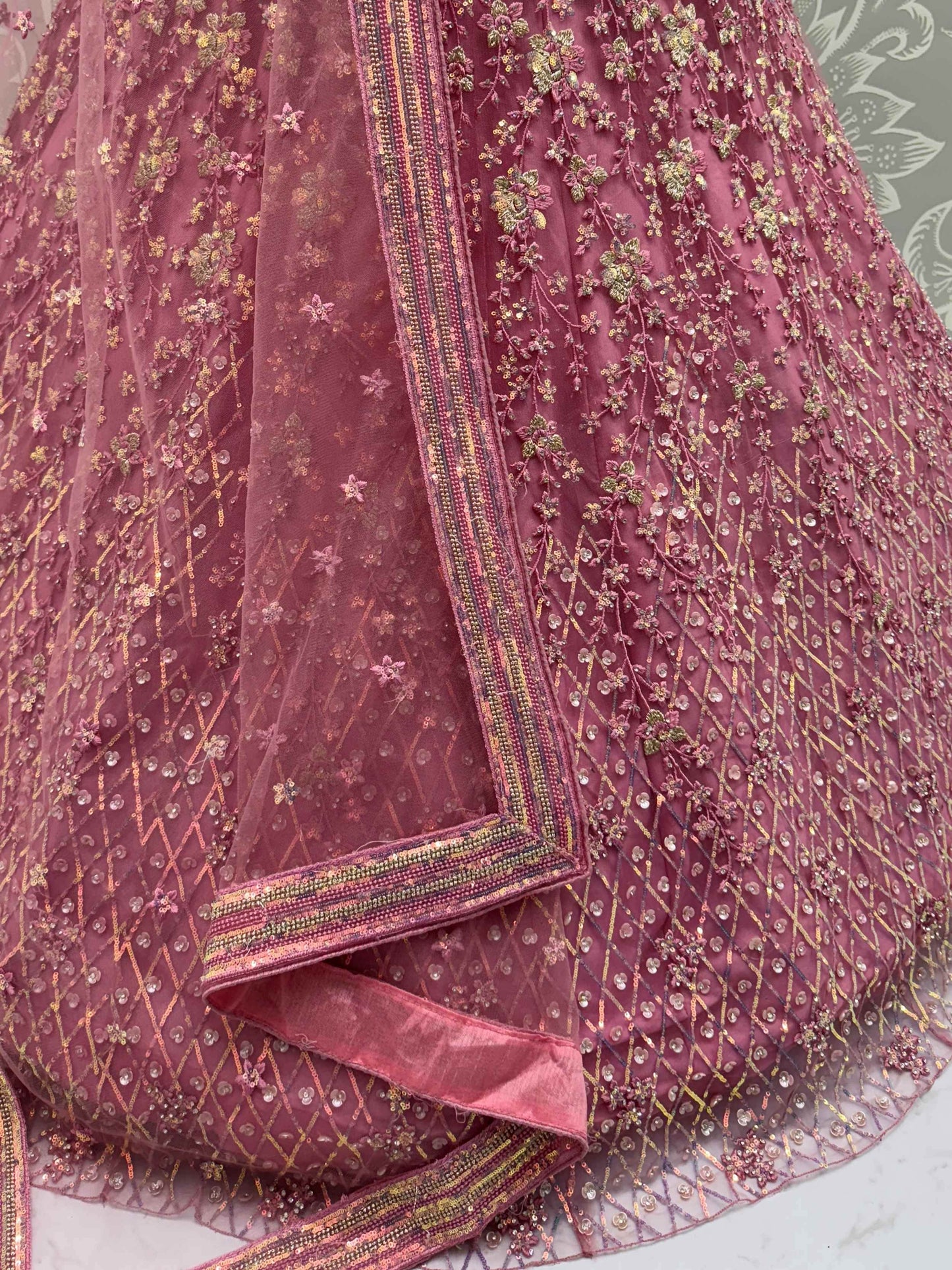 Shiny Pink Multi Thread Work Net Engagement Wear Lehenga With Blouse