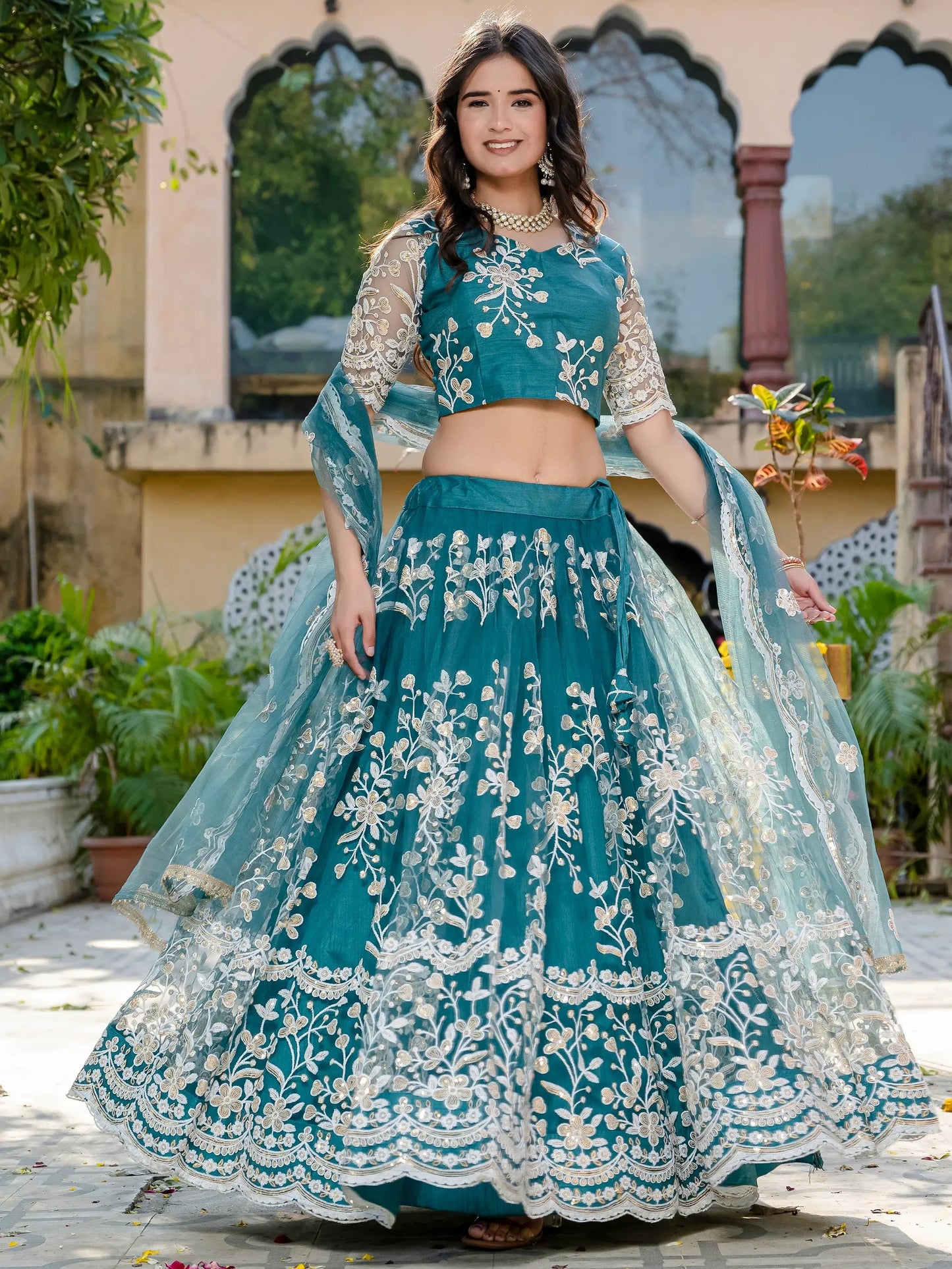 Beautiful Teal Blue Thread Embroidered Net Designer Lehenga Choli - Zeel Clothing