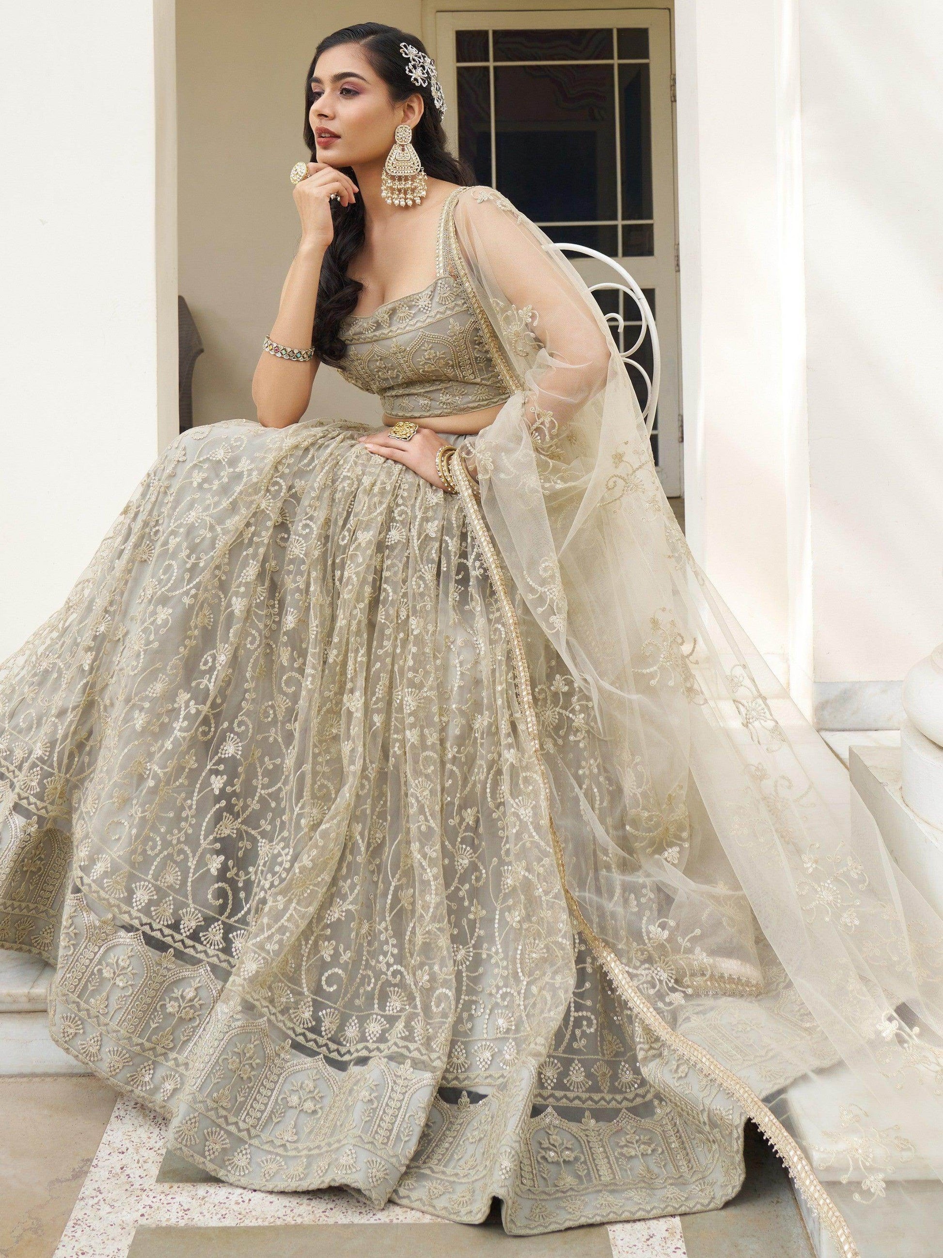 Bewitching Ivory Thread Work Net Engagement Wear Lehenga Choli - Zeel Clothing