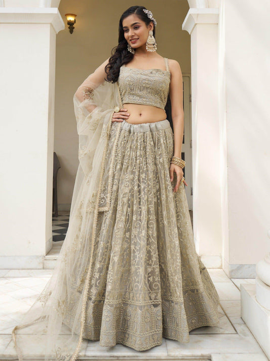 Bewitching Ivory Thread Work Net Engagement Wear Lehenga Choli - Zeel Clothing