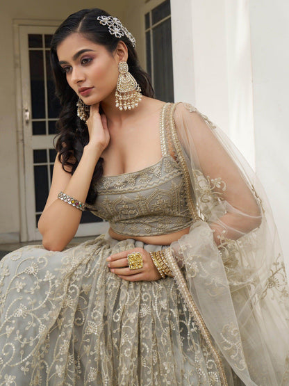 Bewitching Ivory Thread Work Net Engagement Wear Lehenga Choli - Zeel Clothing
