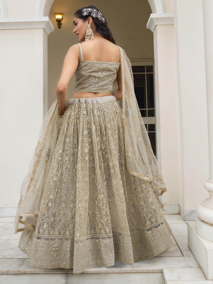 Bewitching Ivory Thread Work Net Engagement Wear Lehenga Choli - Zeel Clothing