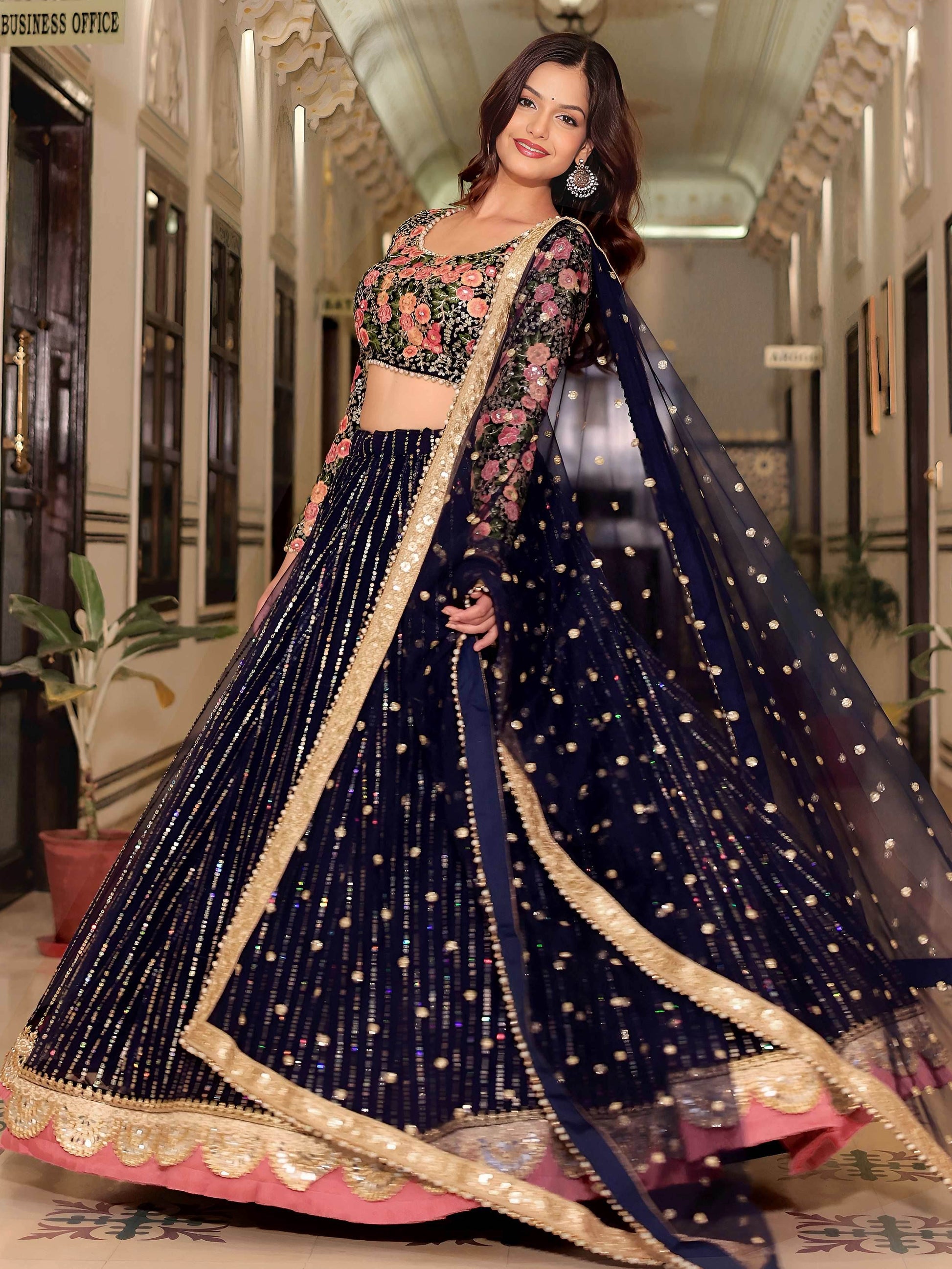Glamorous Navy Blue Floral Embroidery Net Engagement Wear Lehenga With Blouse