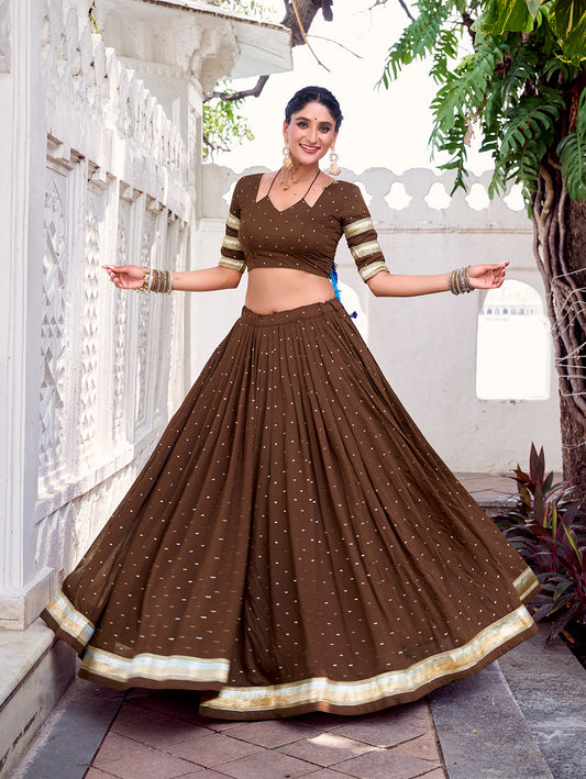 Brown Color Zari Weaving Work With Embossed Design Chanderi Lehenga Choli
