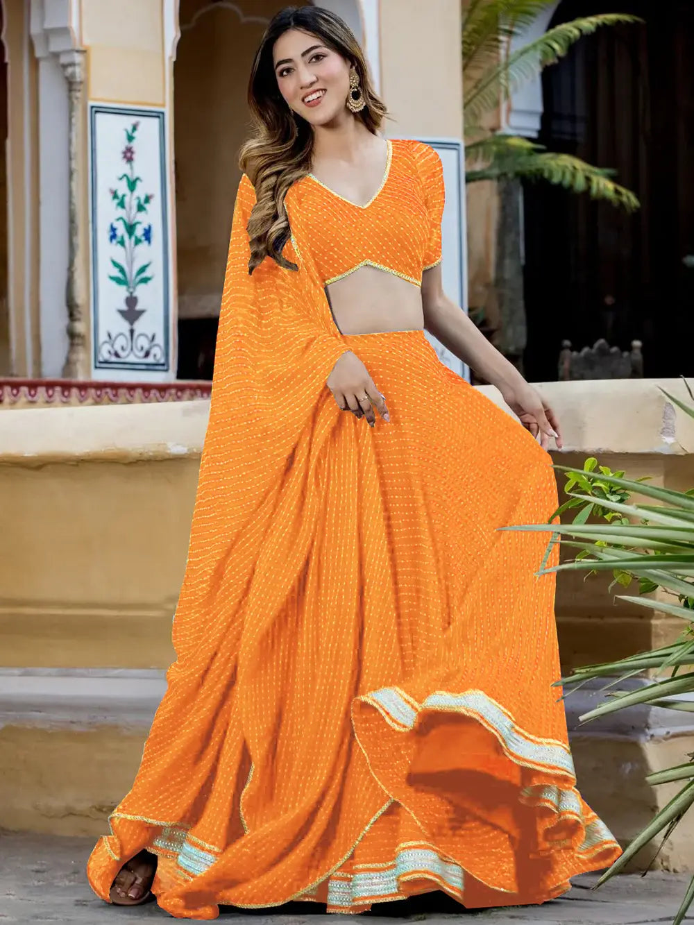 Enchanting Orange Laheriya Print Georgette Designer Lehenga Choli - Zeel Clothing