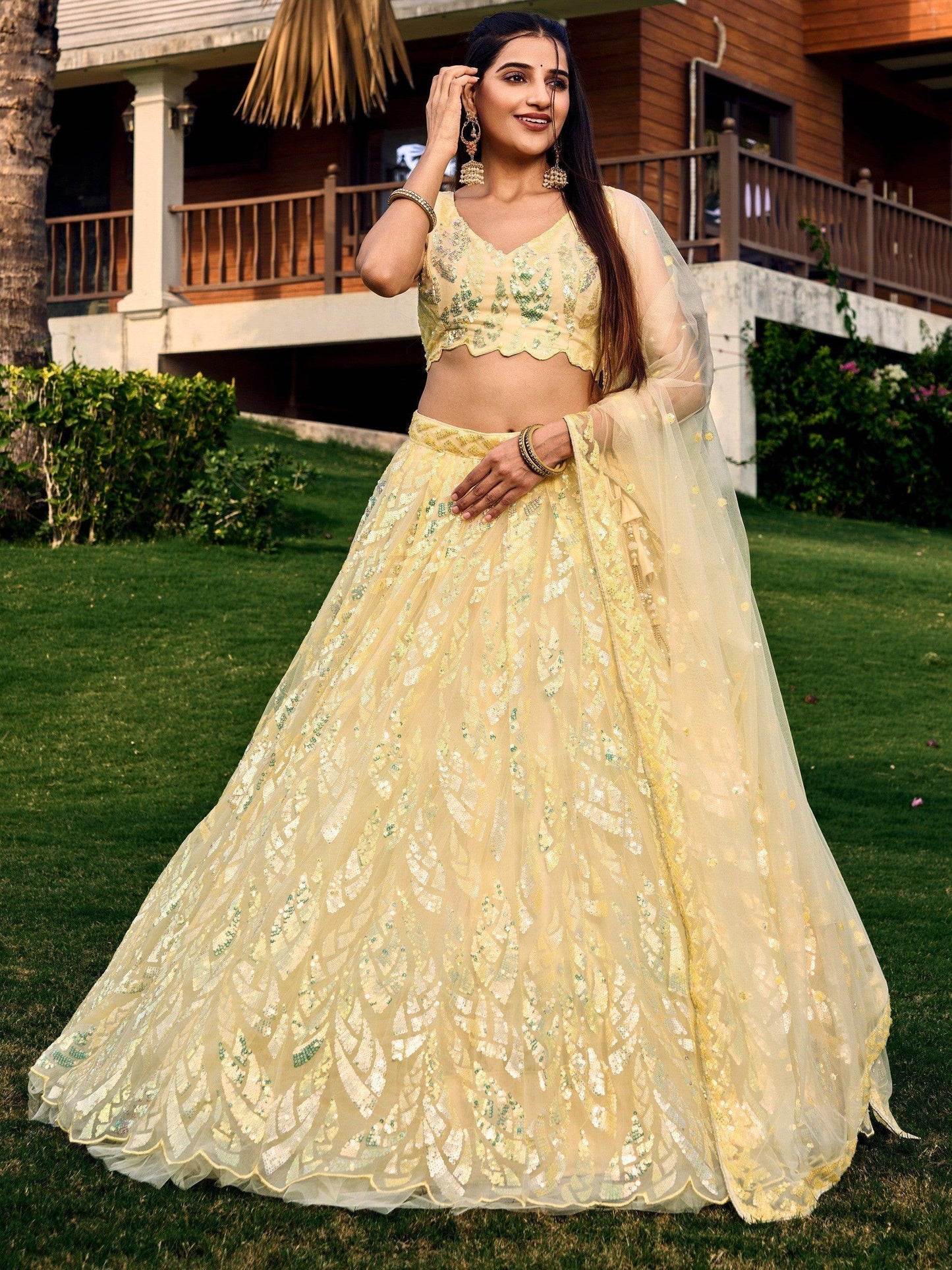 Excellent Yellow Sequins Net Haldi Wear Lehenga Choli With Dupatta - Zeel Clothing