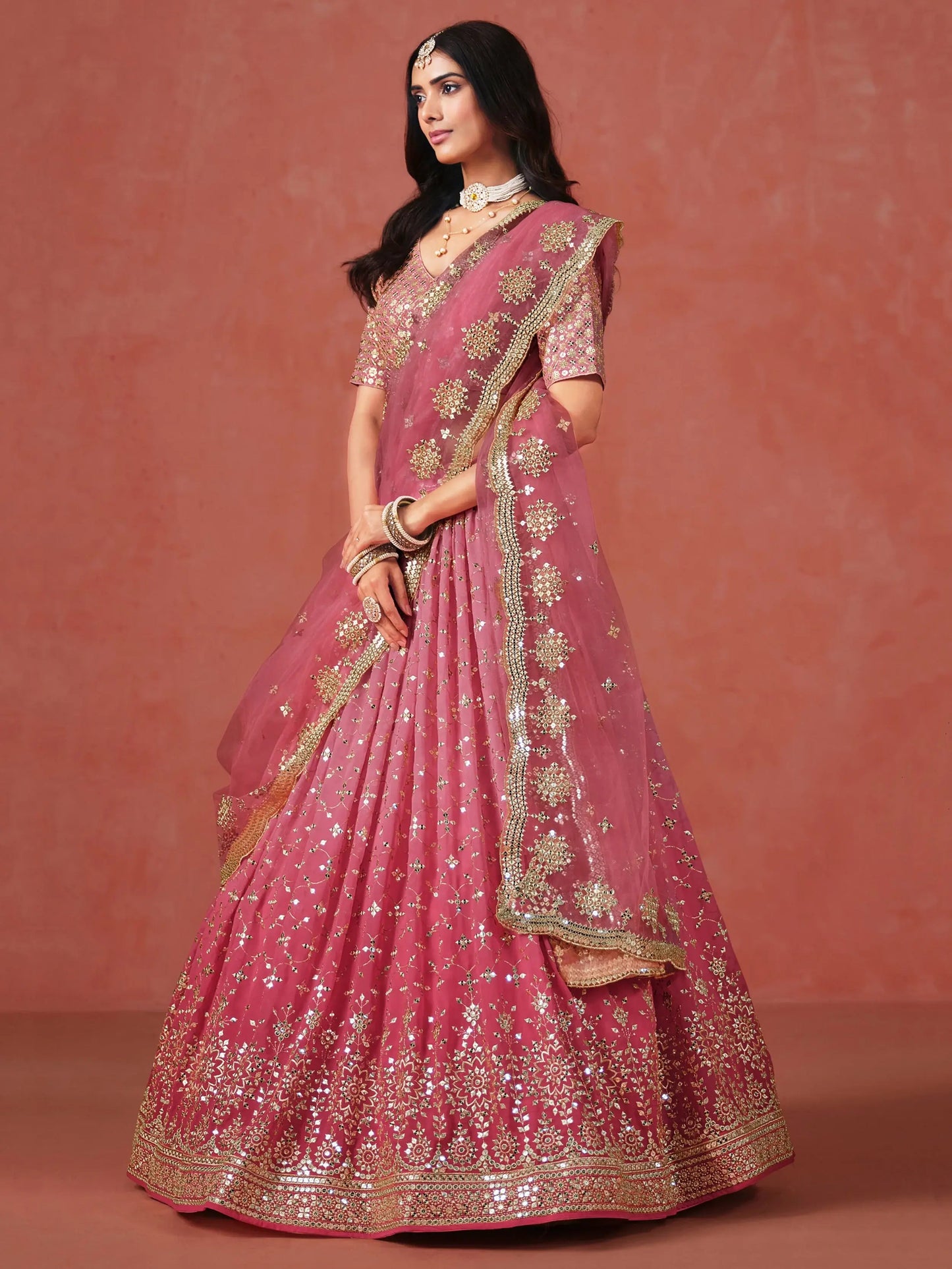 Fabulous Peach Georgette Embroidered Zari Lehenga Choli With Dupatta - Zeel Clothing