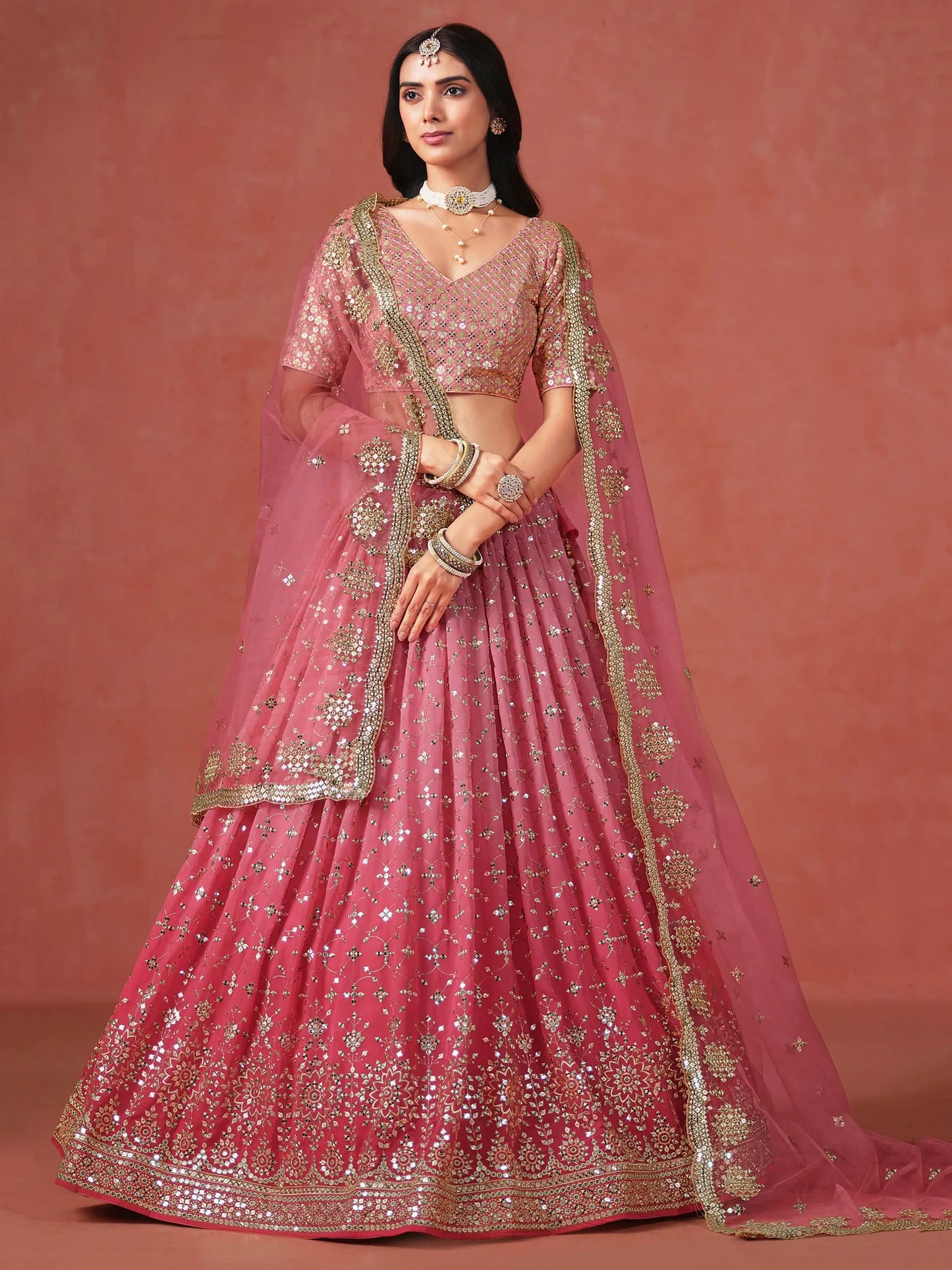 Fabulous Peach Georgette Embroidered Zari Lehenga Choli With Dupatta - Zeel Clothing
