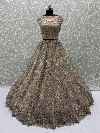 Fantabulous Golden Zircon Work Net Bridal Wear Lehenga Choli With Dupatta - Zeel Clothing