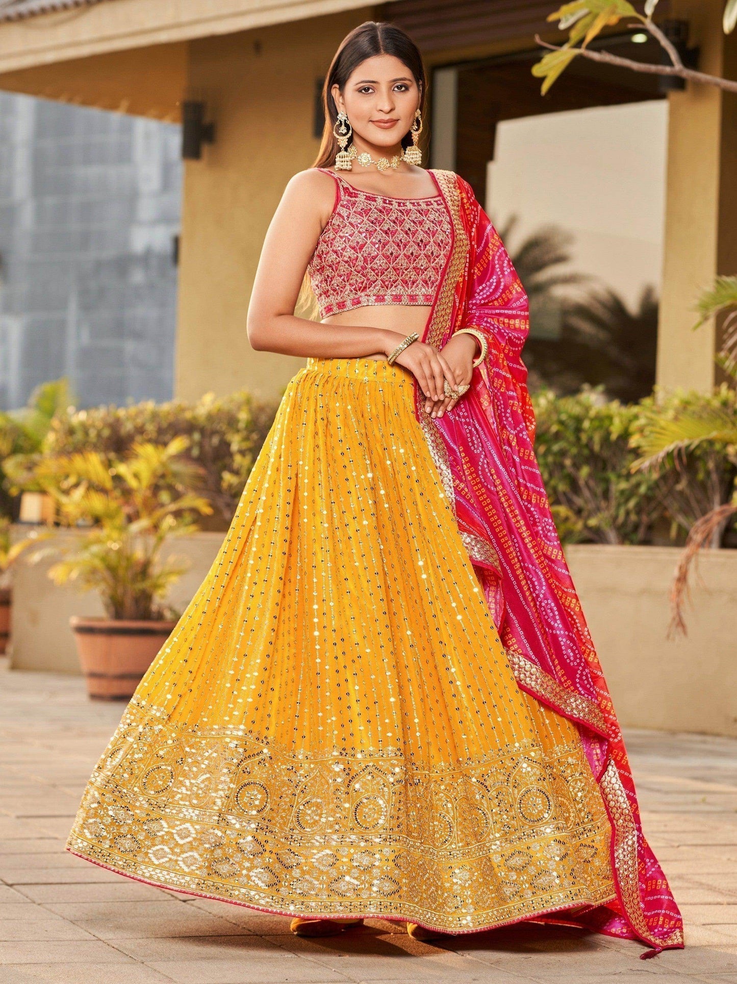 Fascinating Yellow Sequins Georgette Traditional Lehenga Choli - Zeel Clothing