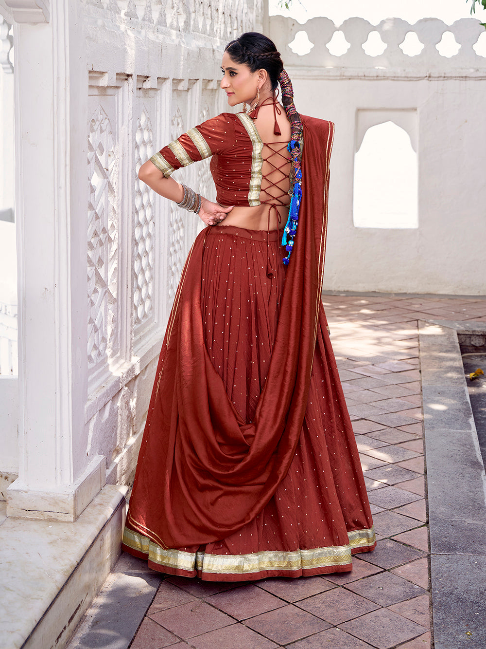 Rust Orange Color Zari Weaving Work With Embossed Design Chanderi Lehenga Choli
