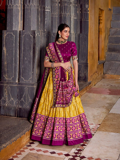 Mustard Color Ikkat Patola Printed Tasar Silk Lehenga Choli