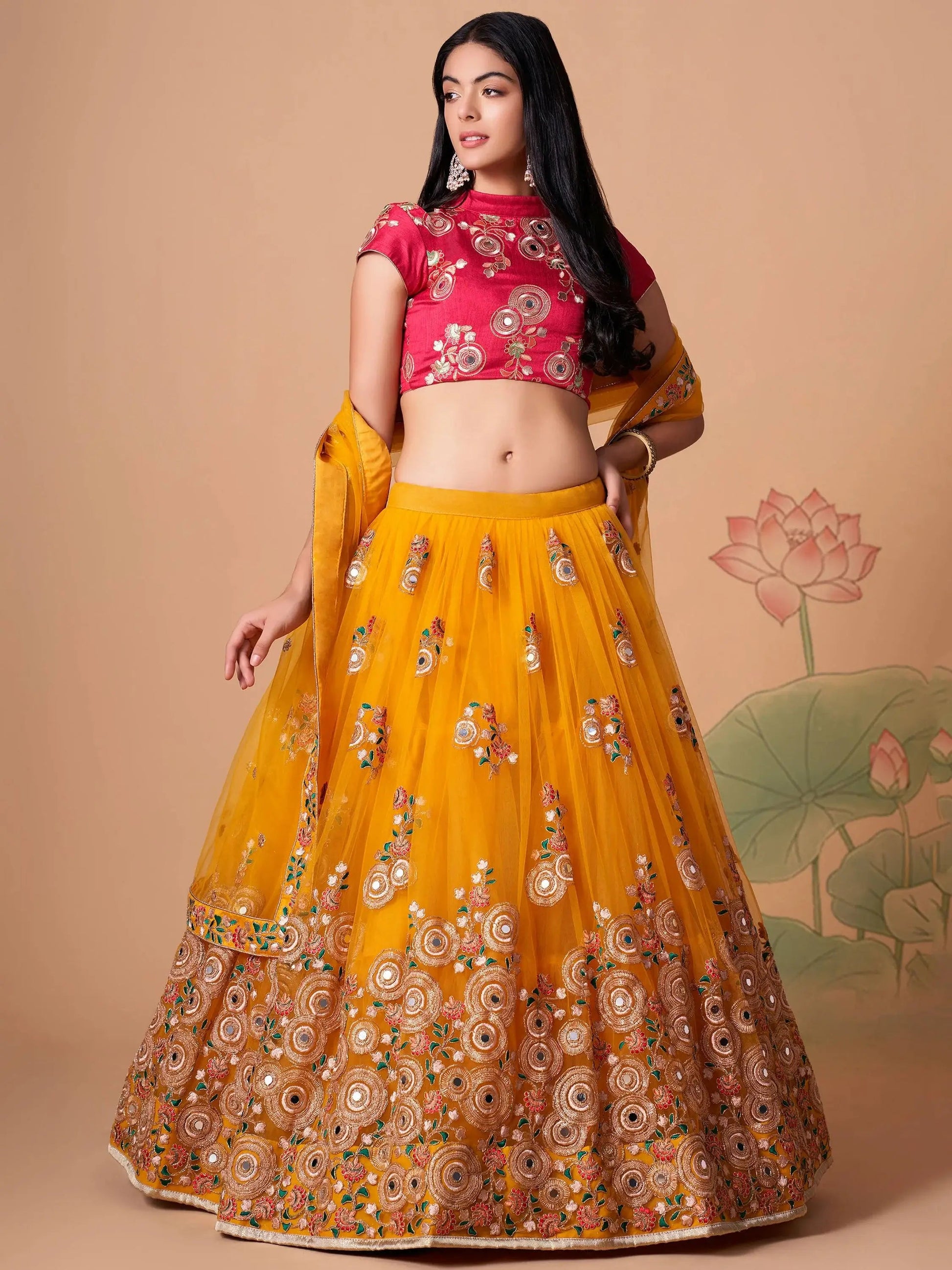 Impressive Yellow Mirror Work Net Reception Wear Lehenga Choli - Zeel Clothing
