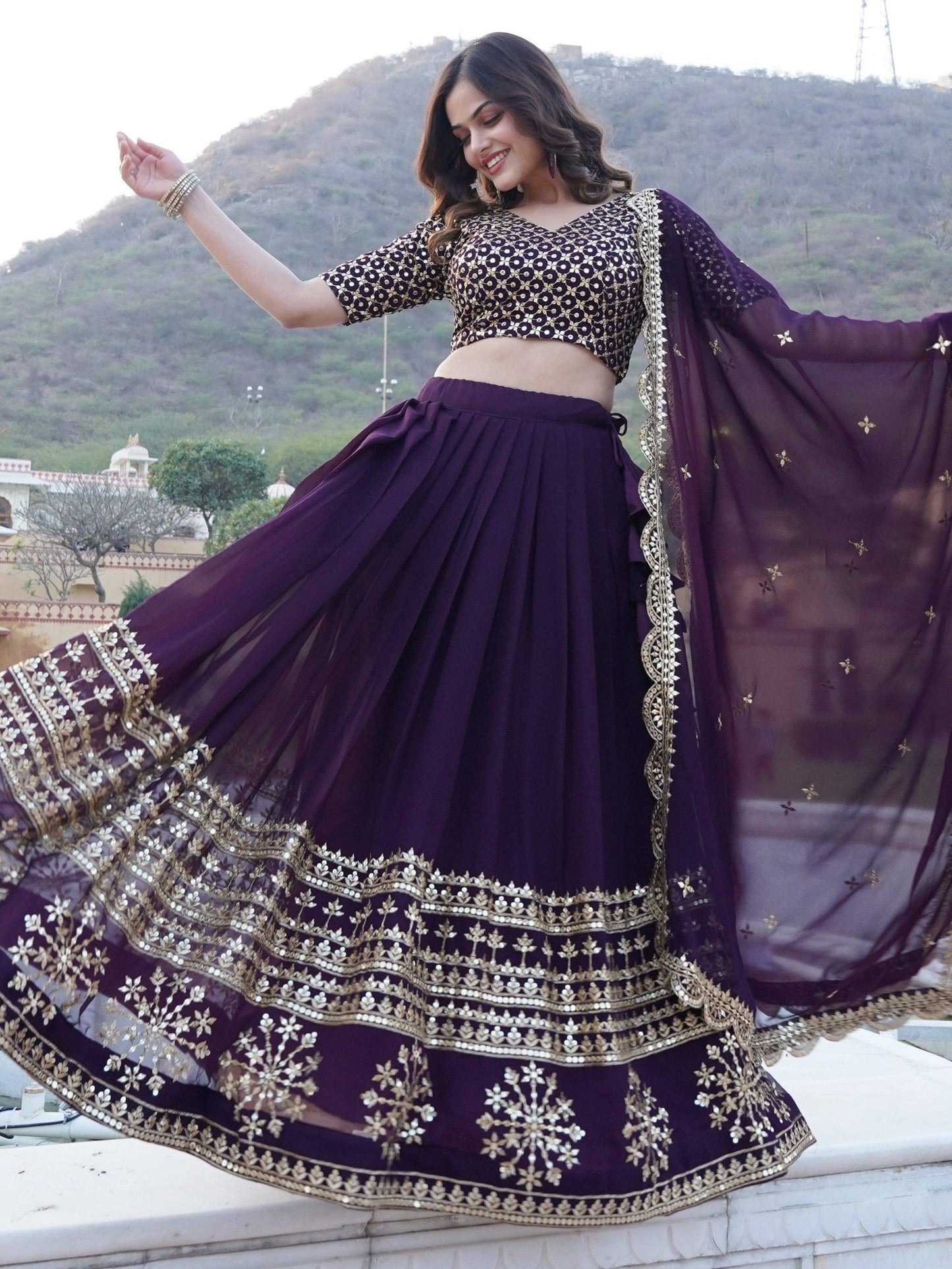 Surprising Purple Sequins Georgette Wedding Wear Lehenga Choli