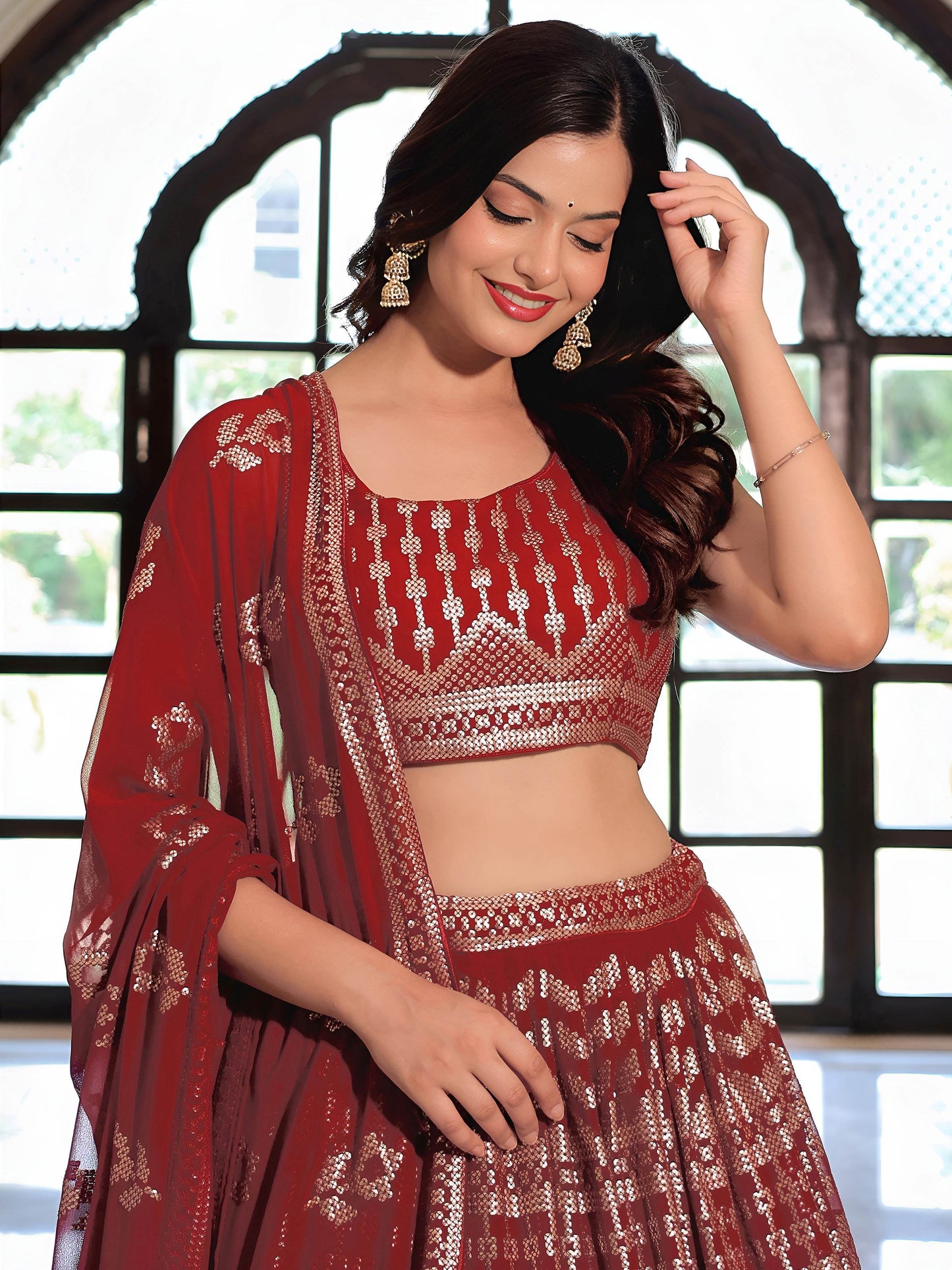 Noteworthy Maroon Sequins Georgette Reception Wear Lehenga Choli