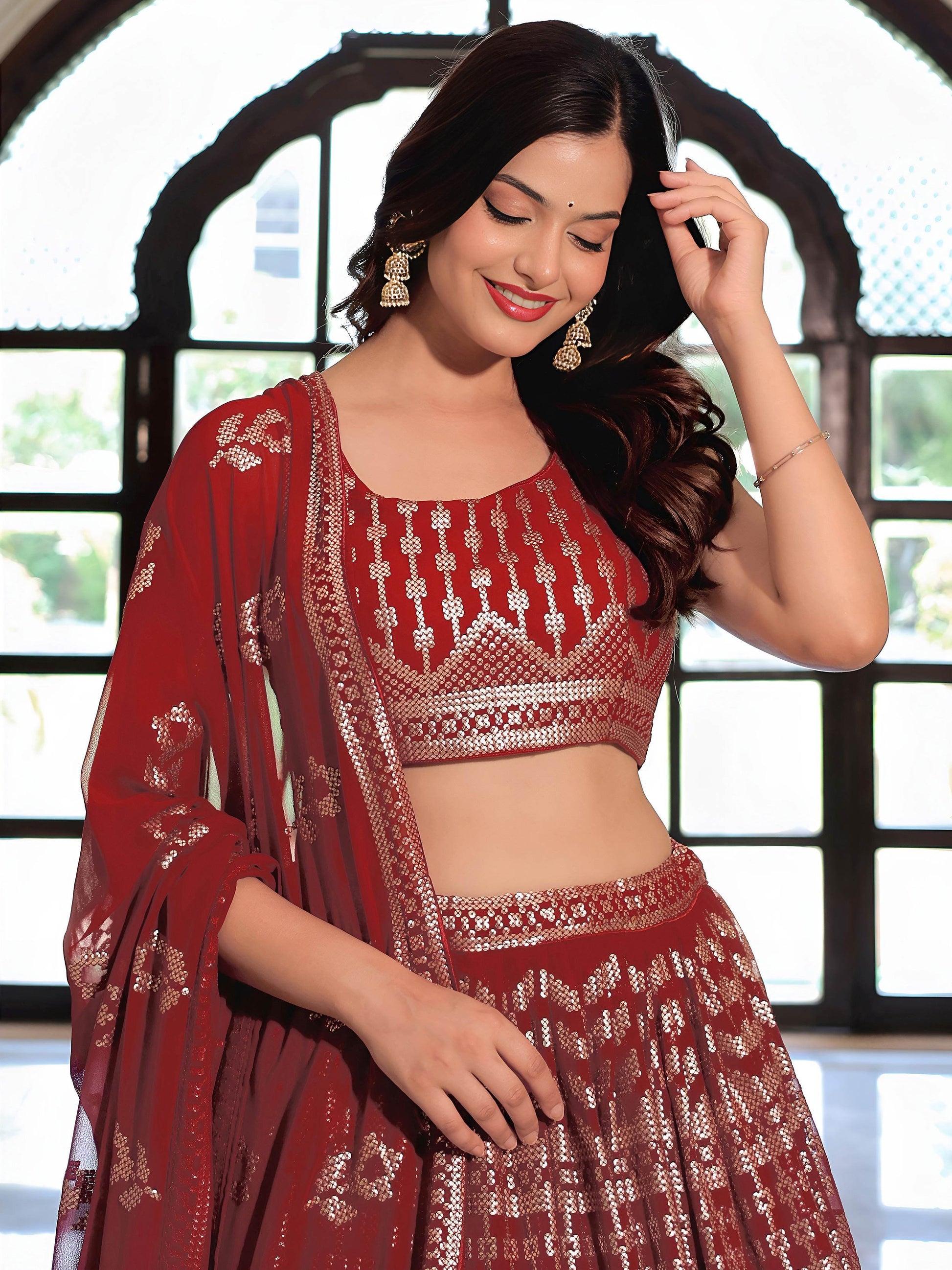 Noteworthy Maroon Sequins Georgette Reception Wear Lehenga Choli