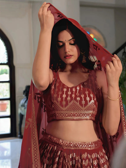 Noteworthy Maroon Sequins Georgette Reception Wear Lehenga Choli