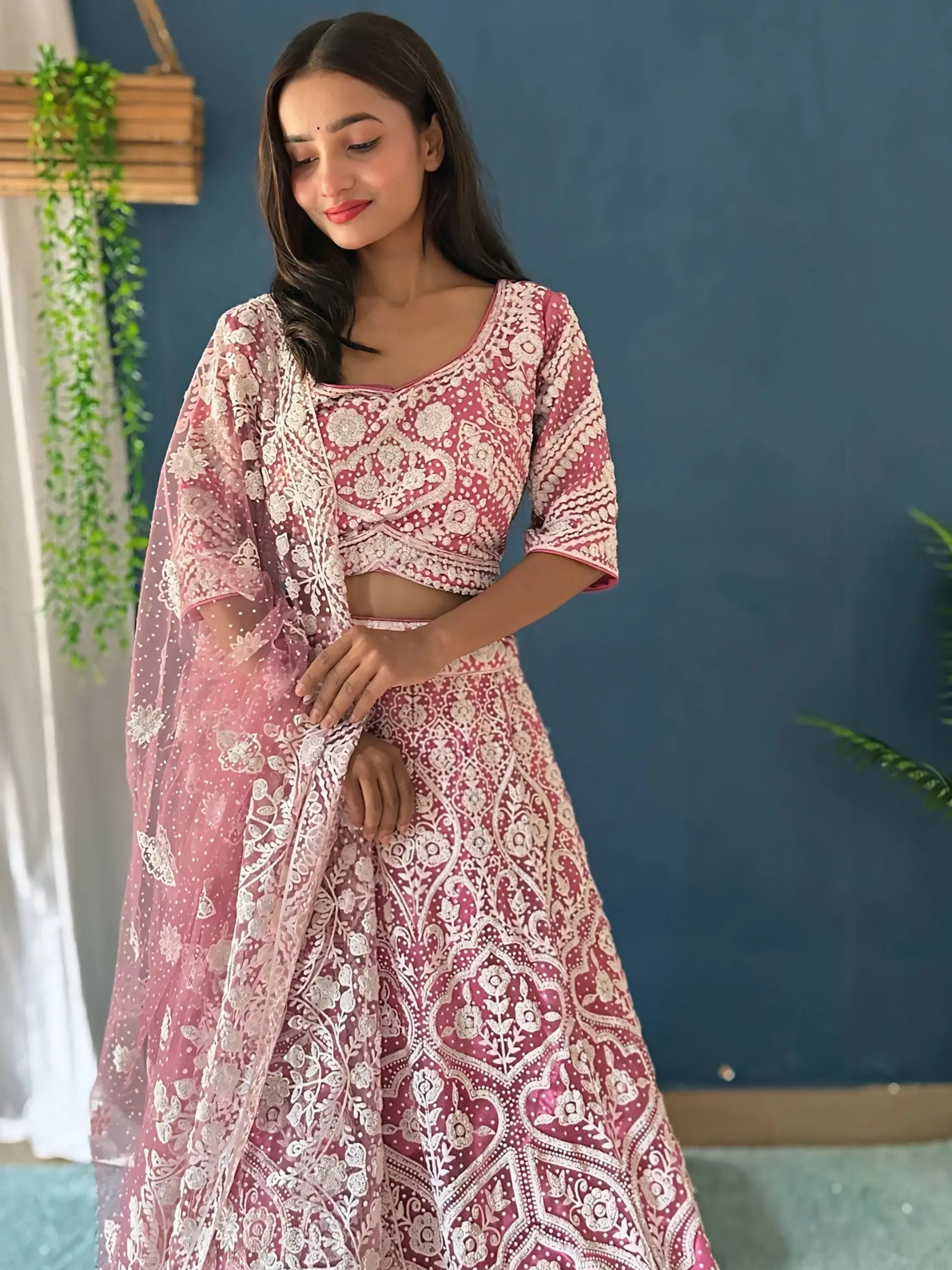 Mesmerizing Pink Beads Work Net Engagement Wear Lehenga Choli - Zeel Clothing