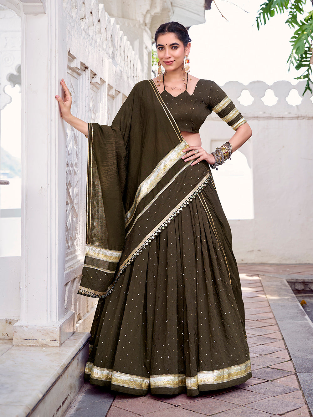 Mehendi Color Zari Weaving Work With Embossed Design Chanderi Lehenga Choli