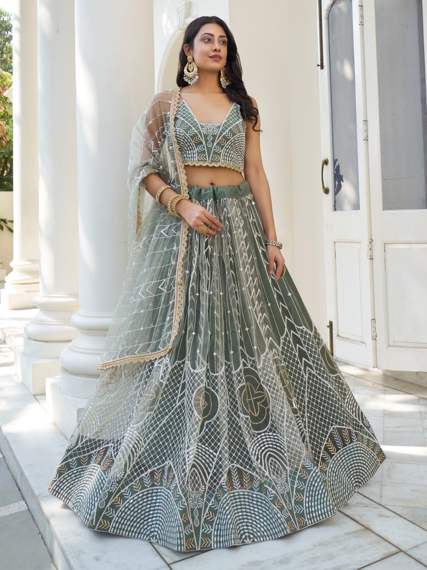 Enchanting Dusty Green Thread Work Net Bridesmaid Lehenga Choli