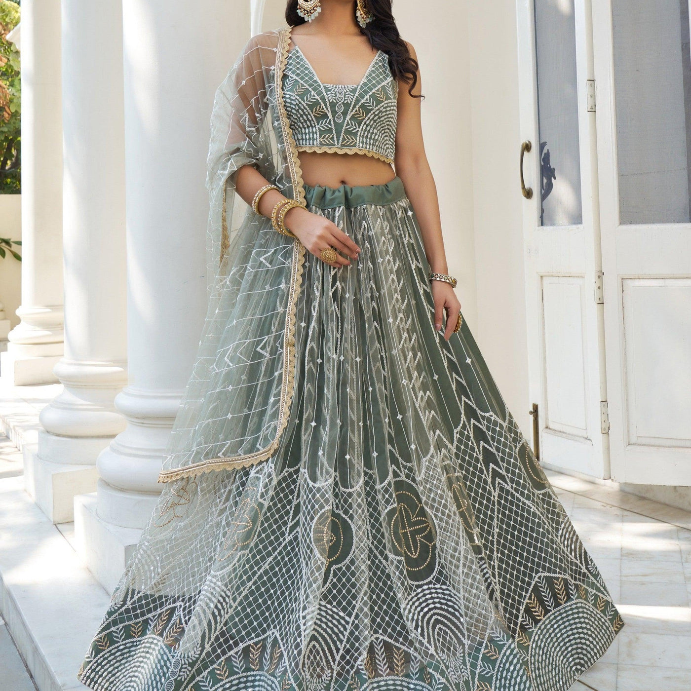 Enchanting Dusty Green Thread Work Net Bridesmaid Lehenga Choli