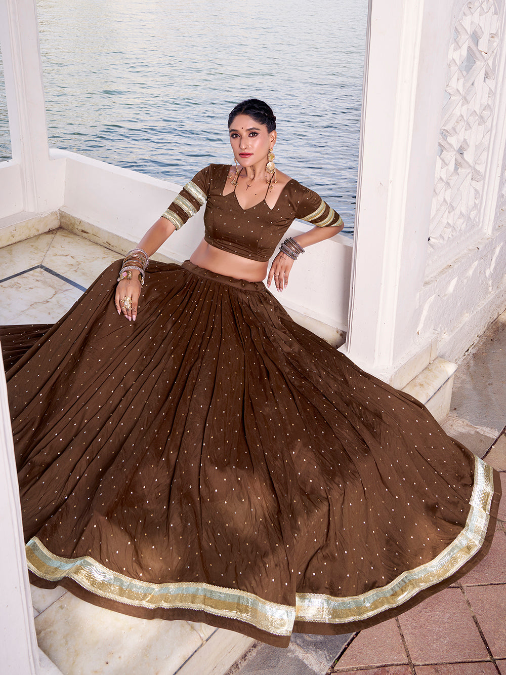 Brown Color Zari Weaving Work With Embossed Design Chanderi Lehenga Choli
