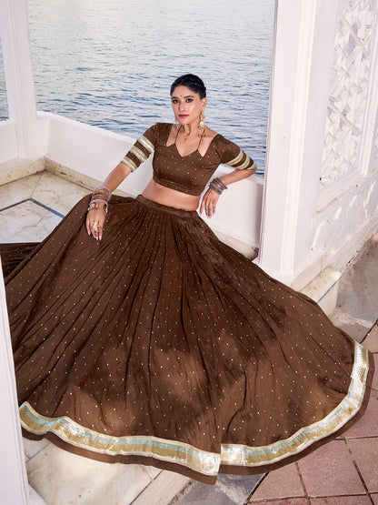 Brown Color Zari Weaving Work With Embossed Design Chanderi Lehenga Choli