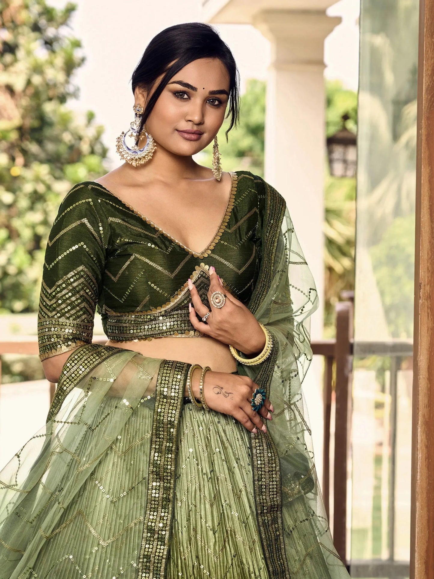 Wonderful Green Sequins Chinon Mehendi Wear Lehenga Choli - Zeel Clothing