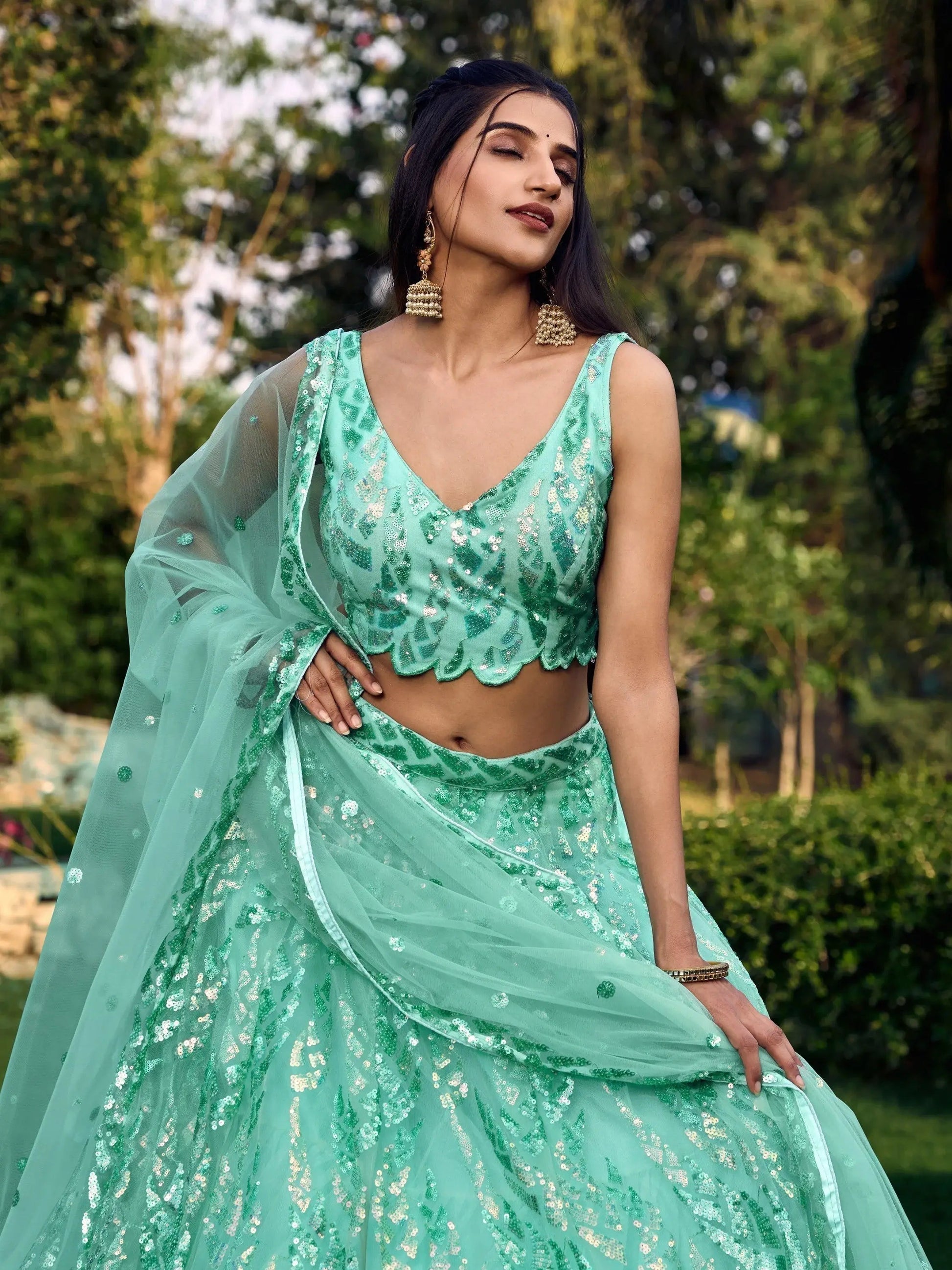 Wonderful Turquoise Sequins Net Reception Wear Lehenga Choli - Zeel Clothing